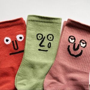 3 pair cartoon expression face socks. Dress tube socks novelty print Smiley face